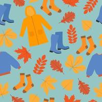 Autumn seamless pattern. Raincoat, sweater, rubber boots, socks and falling leaves on blue background. Fall season background. Vector illustration