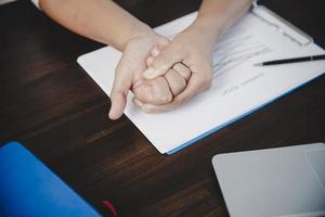 Arthritis person, finger woman ache from working in office. Concept office syndrome hand pain from occupational disease, woman having wrist pain from using laptop computer, wrist pain. photo