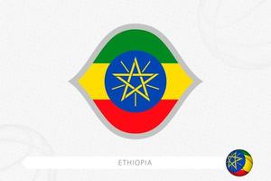 Ethiopia flag for basketball competition on gray basketball background. vector