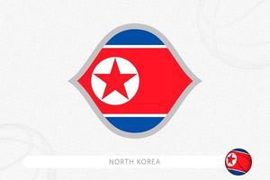 North Korea flag for basketball competition on gray basketball background. vector