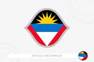 bandera de antigua y barbuda para la competición de baloncesto sobre fondo gris de baloncesto. vector