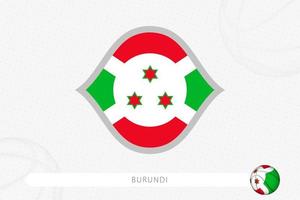 Burundi flag for basketball competition on gray basketball background. vector