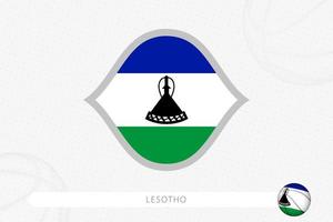 bandera de lesotho para la competición de baloncesto sobre fondo gris de baloncesto. vector