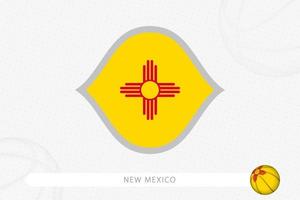 New Mexico flag for basketball competition on gray basketball background. vector