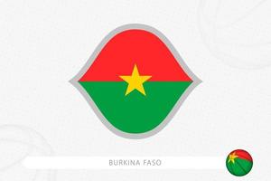 Burkina Faso flag for basketball competition on gray basketball background. vector