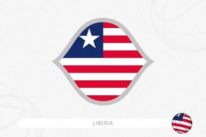 Liberia flag for basketball competition on gray basketball background. vector