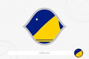 bandera de tokelau para la competencia de baloncesto sobre fondo gris de baloncesto. vector