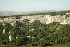 View of green valley. Beautiful summer landscape. Sky and greenery. photo