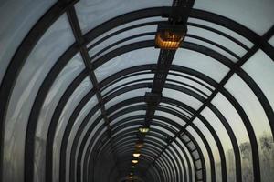 Tunnel in evening. Lamps in pedestrian crossing. Architecture details. photo