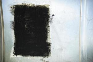 Black spot. Painted over graffiti. Black Square in Street Art. photo