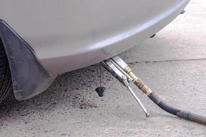 Closeup and crop Gas filling in car. photo