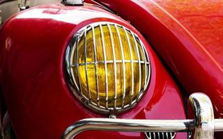 Close up headlamp red retro car photo