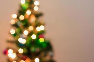Christmas tree with bokeh light blur background photo