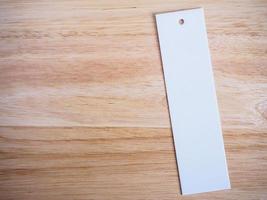 blank price label on wood background photo