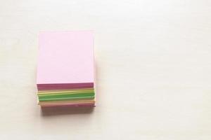 stacks of blank colorful sheets of note paper photo