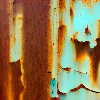 Textured metal surface with detailed traces of corrosion, rust and scratches photo