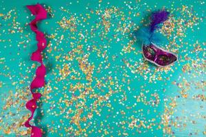 Background of confetti with elements related to the carnival and summer photo