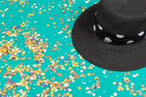 Background of confetti with elements related to the carnival and summer photo