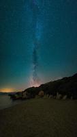 Milky Way Galaxy over the sea photo