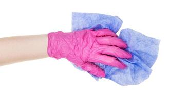hand in pink glove holds crumpled blue rag cutout photo