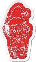 Distressed sticker featuring man with beard sticking out tongue wearing santa hat vector