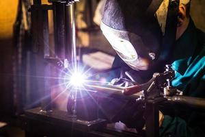Man welding at work photo