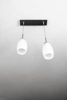 modern frosted glass ceiling lamp on white ceiling photo