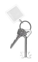 two keys on ring with blank keychain isolated photo