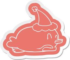 penguin lying on belly wearing santa hat vector