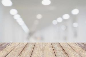 wood counter with abstract blur hospital medical background photo