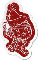 cartoon distressed sticker of a confident astronaut wearing santa hat vector