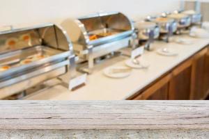 Many buffet heated trays in the hotel blur background photo