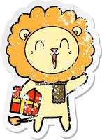 distressed sticker of a laughing lion cartoon with christmas present vector