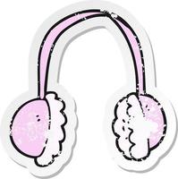 retro distressed sticker of a cartoon ear muffs vector