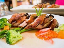 roasted duck with coffee seeds photo