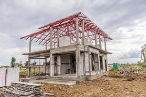 construction residential new house in progress at building site photo