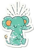 worn old sticker of a tattoo style cute elephant vector