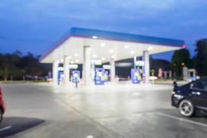 Blur Gas station at night time for background photo