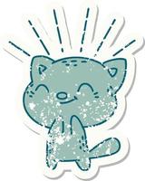 worn old sticker of a tattoo style happy cat vector