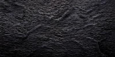 Dark gray rustic surface texture copy space. photo
