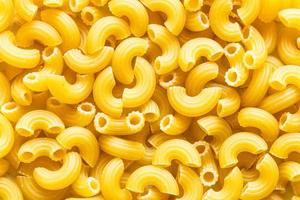 food background from chifferini rigati pasta photo