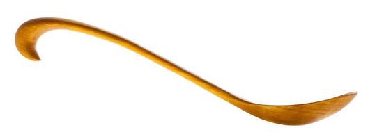 side view of carved alder wood tablespoon isolated photo