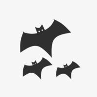 flat illustration of three black bats isolated on a white background suitable for halloween elements vector