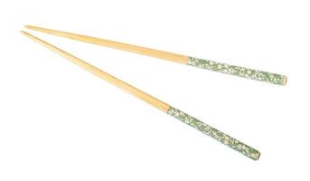 decorated wooden chopsticks isolated on white photo