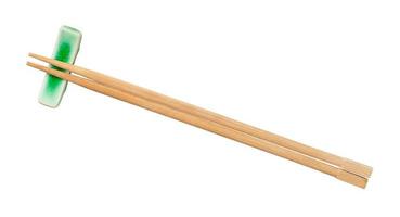 top view of beech chopsticks on chopstick rest photo