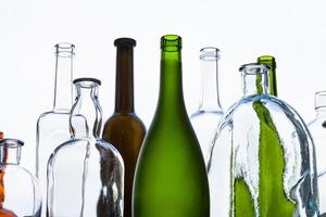 various empty bottles and view of gray sky photo