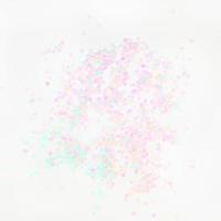Pearl pastel confetti sparkles on white background photo