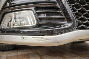 car bumper scratched paint damage photo