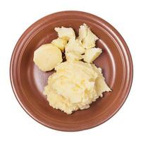 top view of boiled and mashed potatoes on plate photo
