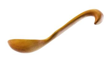 side view of hand carved maple wooden soup spoon photo